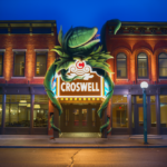 Painted Audrey II into photo of Theater for promotional use. Audrey II on top of the Croswell